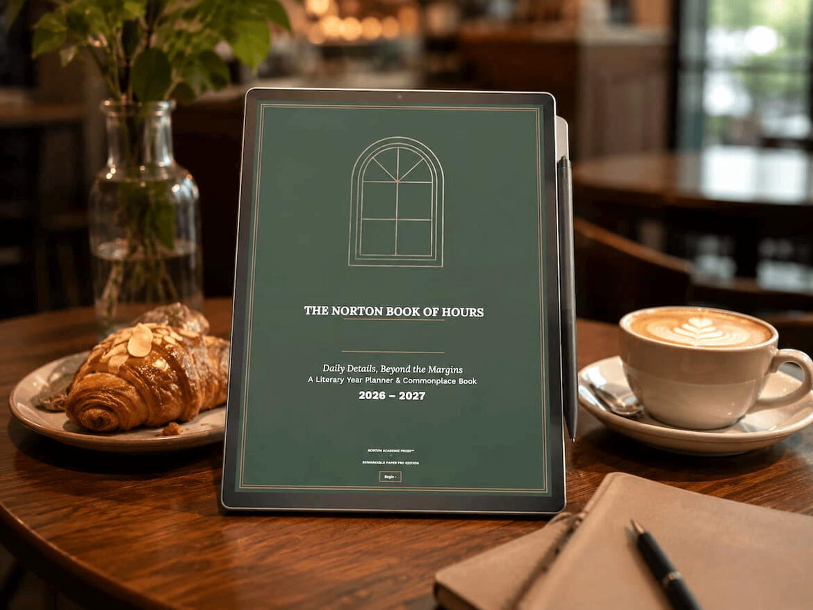 "The Norton Book of Hours cover page on a reMarkable Paper Pro" propped up on table near croissant