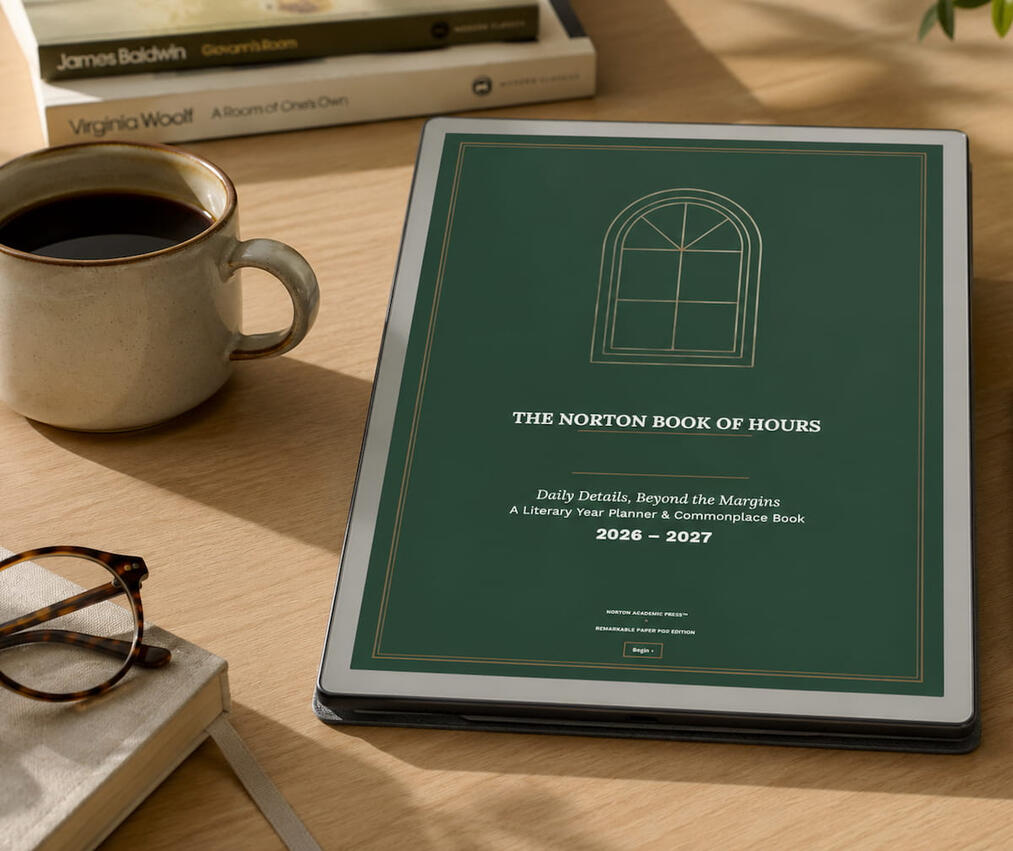 "The Norton Book of Hours cover page on a reMarkable Paper Pro" on table with coffee and additional books